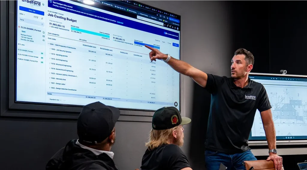 Brad Robinson presenting the Buildertrend App to a group.